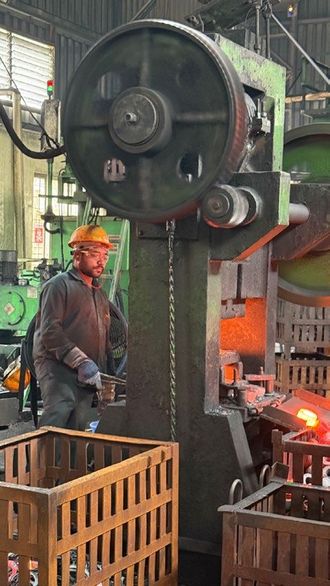 Operator at a forging press