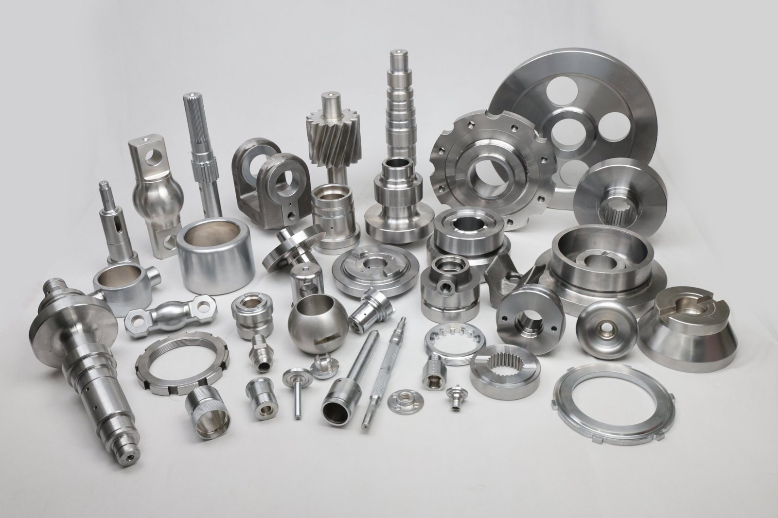 Range of forged and CNC machined steel components made by Arihant CNC