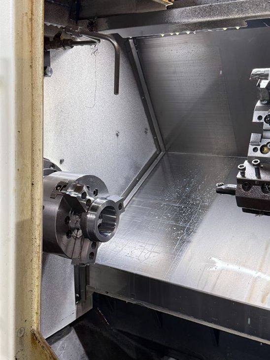 CNC lathe interior with chuck
